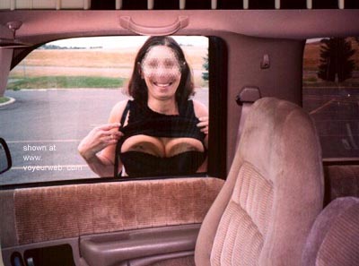 Pic #1Mrs. Happyman Behind Glass