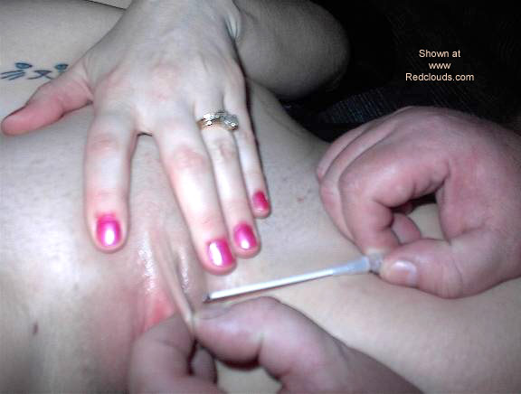 Pic #1Florida Nudist Gets Pierced