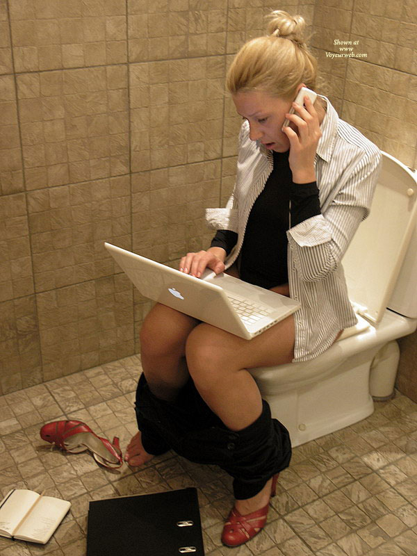 Using Laptop On Toilet , Red Business Pumps, Black Pants, Multitasking, Multitasking Woman On Toilet, Telecommuting Toilet Shot, Striped Button Down Shirt Black Undershirt, Macbook, Black And White Office Apparel, Ibook, Sitting On Toilet