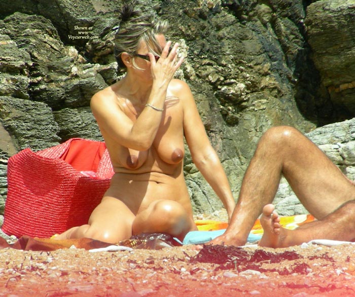 Pic #1Mature On A Beach