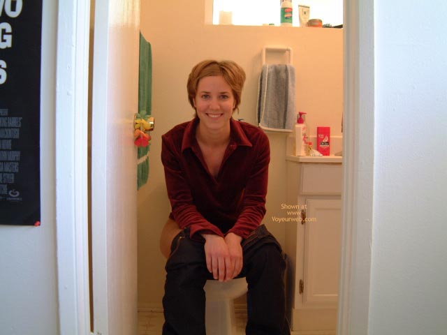 Sitting On Toilet - Jeans, Looking At The Camera , Sitting On Toilet, Pants Pulled Down, Smiling Into Camera, Short Brunette Hair, Looking At Camera, Blue Jeans, Red Blouse