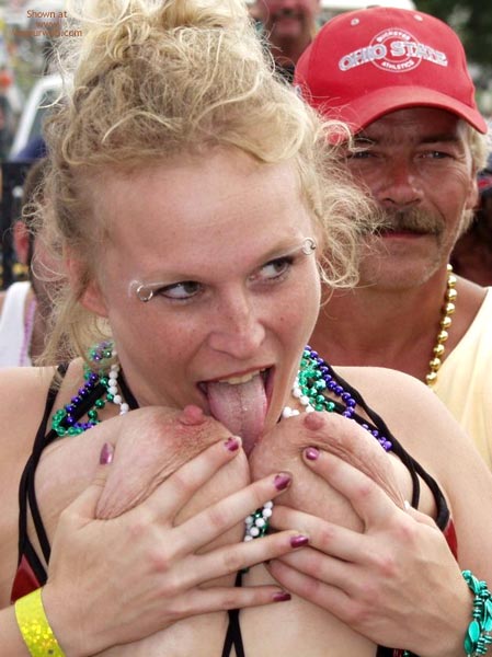 Pic #1Biker Rodeo Chick Swallows Her Nipples!