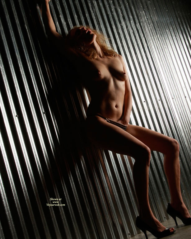 Nude Girl Shadow Light - Blonde Hair, Heels, Naked Girl, Nude Amateur , Erotic Photo, Hand In Panties, Dark Shadows, Open Toed Shoes, Against The Wall, Naked On Metal Wall, Nude Girl Standing Against Wall
