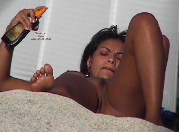 Nude Tanning - Spread Legs , Nude Tanning, Naked Pussy On The Beach, Tight Pussy Lips With Landing Strip, Pancaked Boob, Spreading Legs