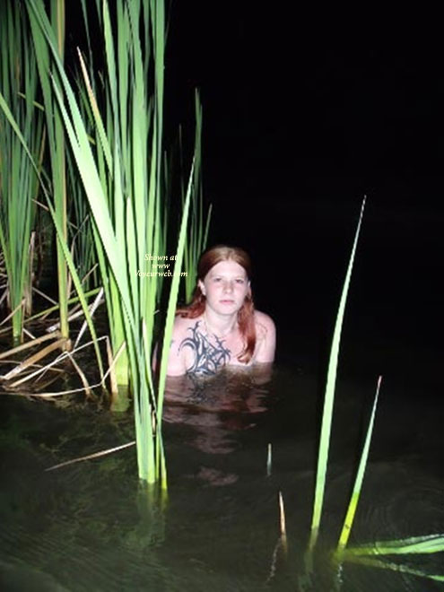Pic #1 Sexy Redhead In And Out Of The Sea 1