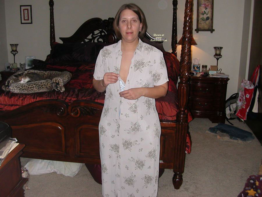 Pic #1Stripping To Black Stockings