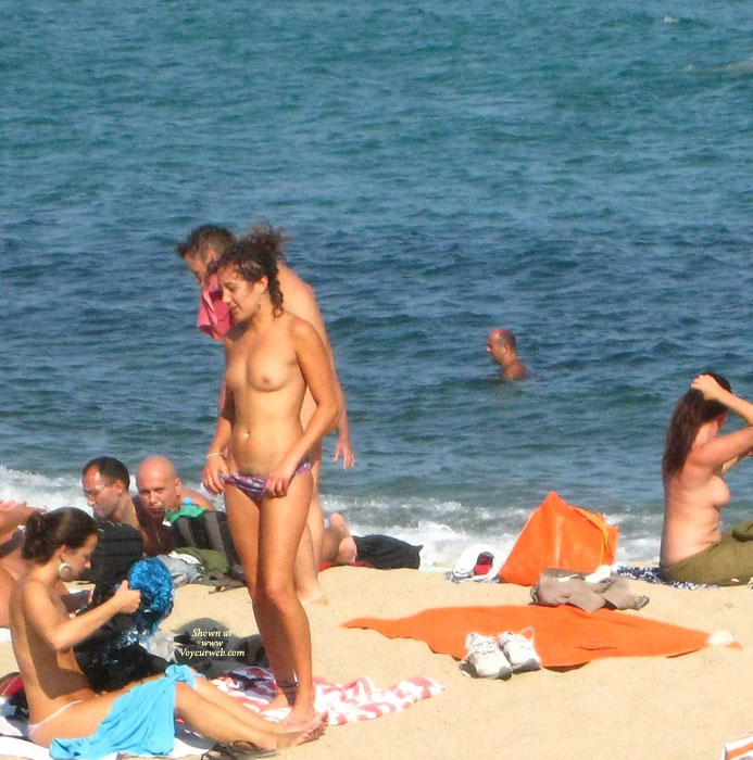Pic #1 Beach Voyeur:&nbsp;Beach Voyeur: Smiling Stripping