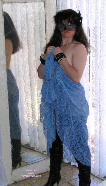 Pic #1Beti Cat Plays With Cuffs