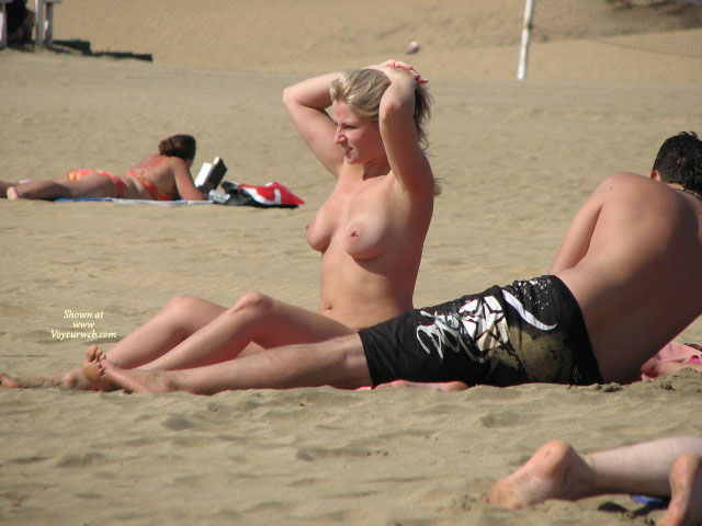 Pierced Nipples Voyeured On Beach - Big Tits, Blonde Hair, Large Breasts, Long Hair, Navel Piercing, Pierced Nipples, Topless Beach, Beach Tits, Beach Voyeur , Double Breast Piercing, Blonde Tanning Breasts, Belly Piercing, Beach Blond, Hands Stuck On Head