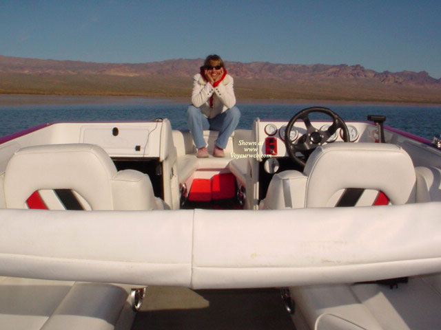 Pic #1Brunette -  Strip Tease On The Lake