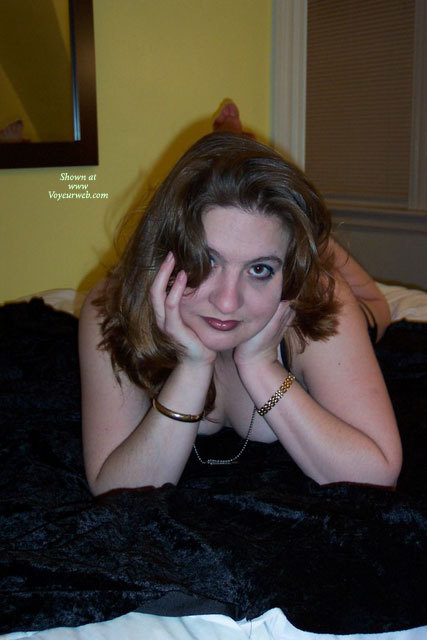 Brunette Lying Naked On Bed Facing Camera - Brown Hair, Brunette Hair, Looking At The Camera, Naked Girl, Nude Amateur , Lying On Velour Bedspread, Bed Nude, Laying On Bed, Brown Hair Covering One Eye, Lying On A Bed, Smiling Directly At The Camera, Gold Braclets, Naked On Bed With Feet Crossed