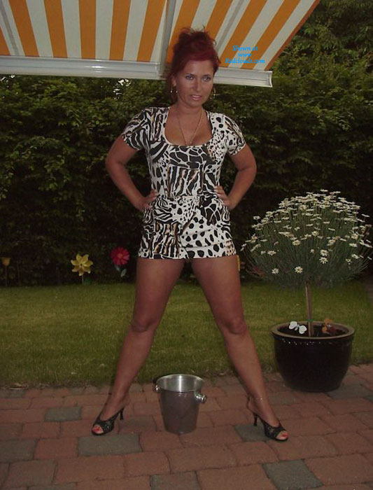 Pic #1Lady E Pissing In Her Garden Part 1