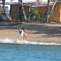 Pic #1 Tattooed Hottie On The Beach
