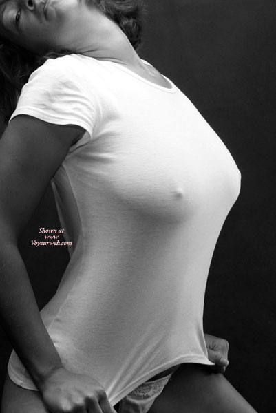 Girl Pulling Her Shirt Down - Black And White, Erect Nipples , Girl Pulling Her Shirt Down, Tee Shirt Nipples, Black And White, Erected Nipples, White T-shirt, White Tee Shirt