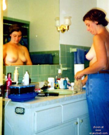 Pic #1Checking herself out