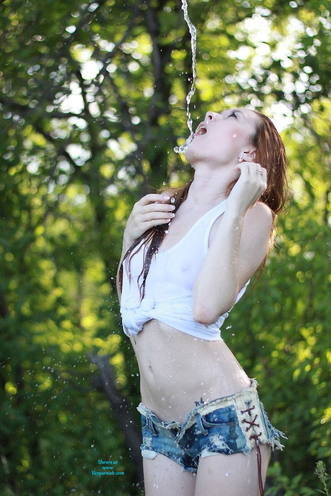 Pic #1Vivienne Getting Wet - Wet, Outdoors, Pussy, Redhead, Shaved, Small Tits