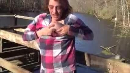 Pic #1Licking Tits in Public - Brunette