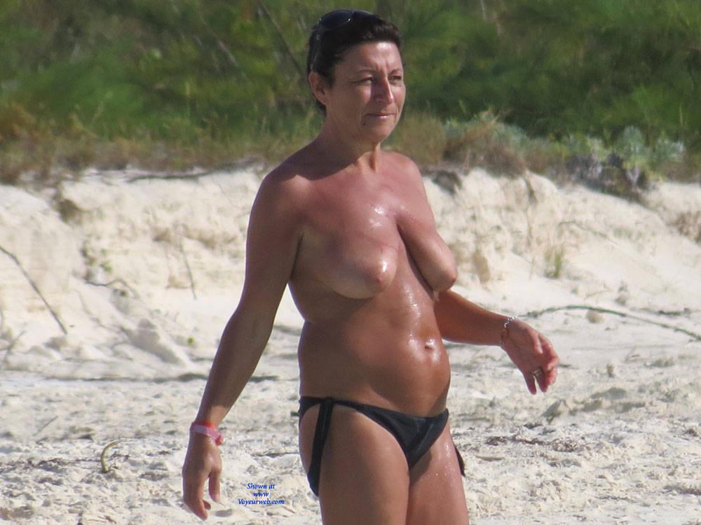 Pic #1Topless Milf At The Beach - Beach Voyeur, Brunette