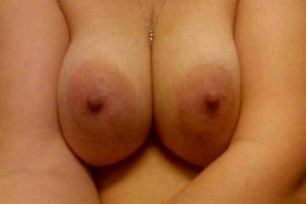 Pic #1 Medium tits of a co-worker - Justina