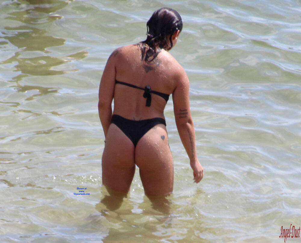 Pic #1Tattooed Brunette Beauty On The Beach - Beach, Brunette, Outdoors, Bikini Voyeur, Amateur, Tattoos