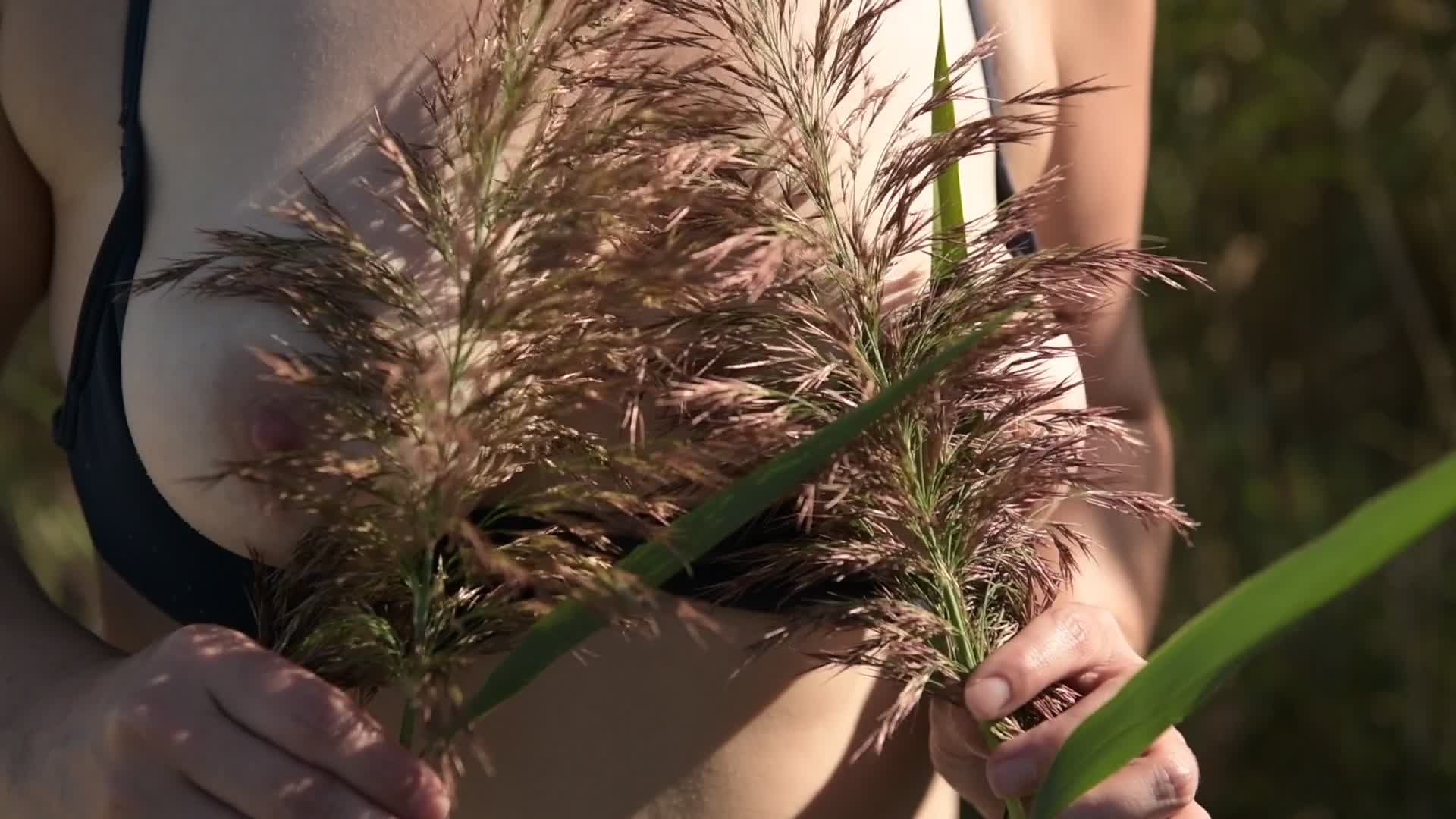 Pic #1Topless on the beach playing with my nipples