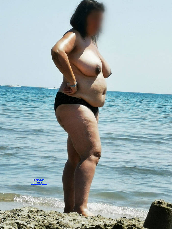 Pic #1Extreme big tits topless French beach 