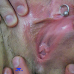 Pic #1opened lips with clit ring.