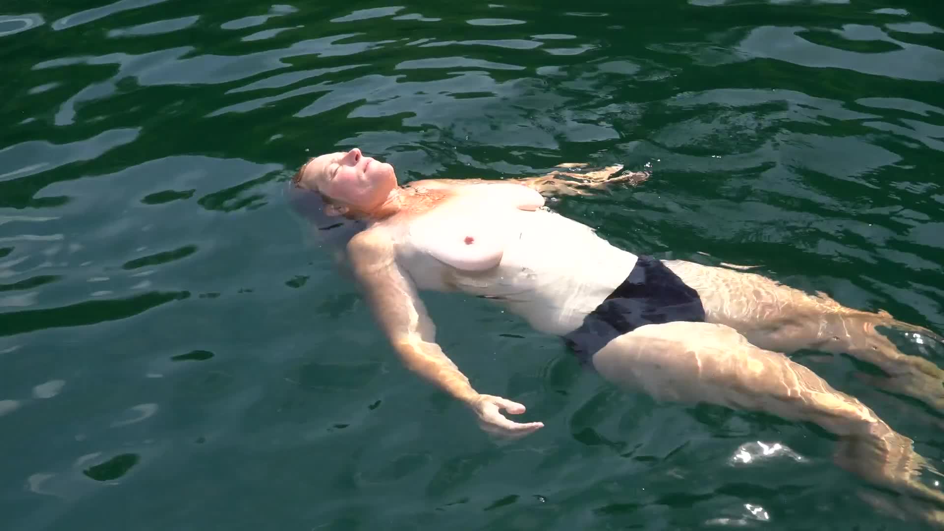 Pic #1topless swim, care to join her