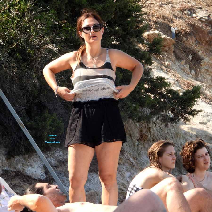 Pic #1Stripping Milf