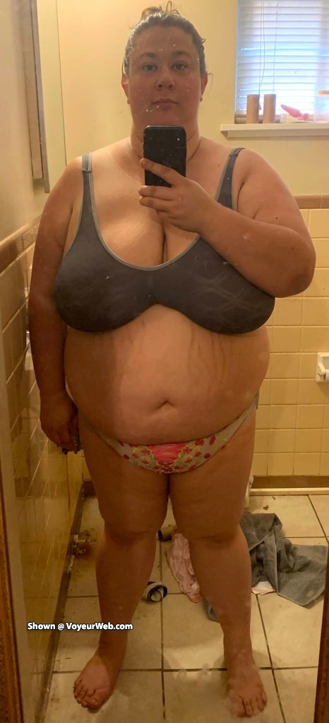 Pic #1Amber is showing off her massive ass and fat rolls