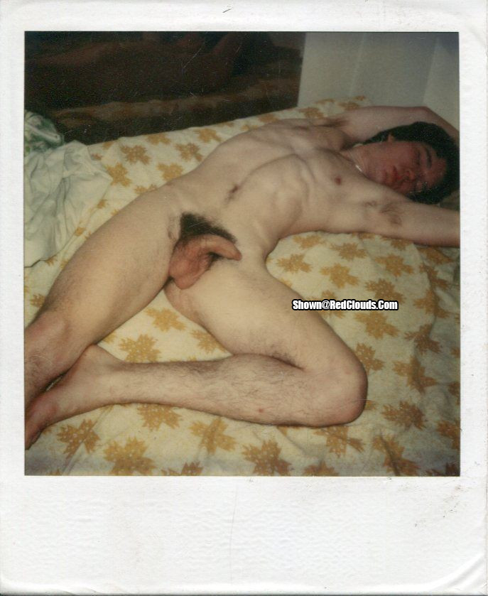 Pic #1Nude male slut sprawled on a bed