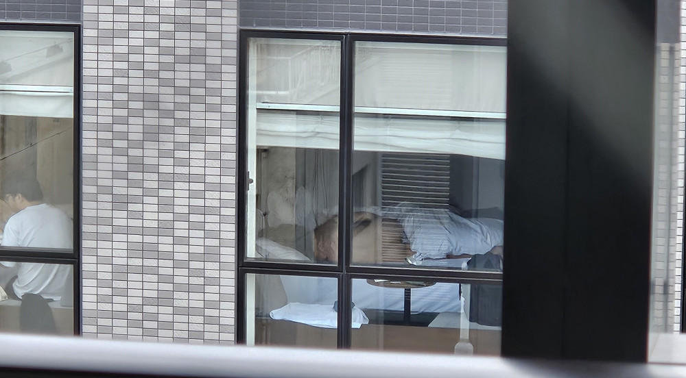 Pic #1Chinese mature lady naked at hotel window