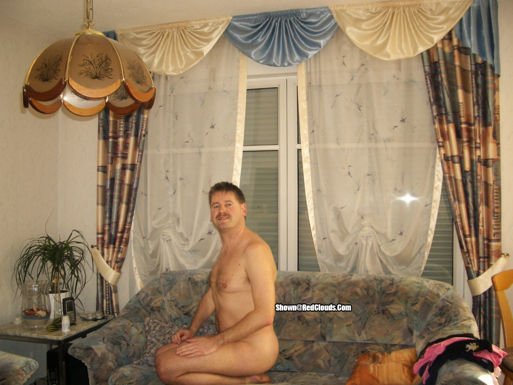 Pic #1Me on the sofa in the living room, some years, ago.