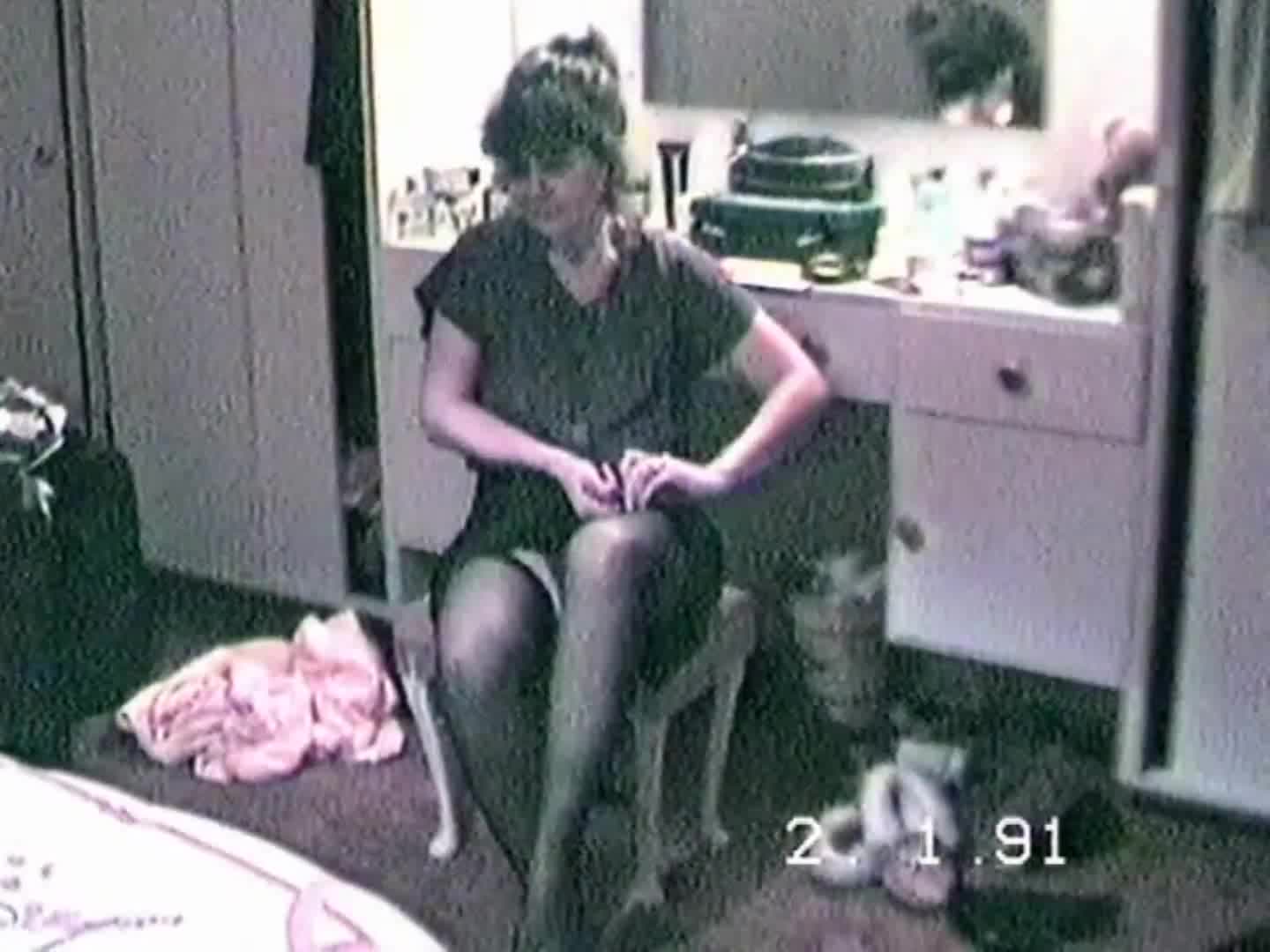 Pic #1Striptease in stockings and skimpy panties