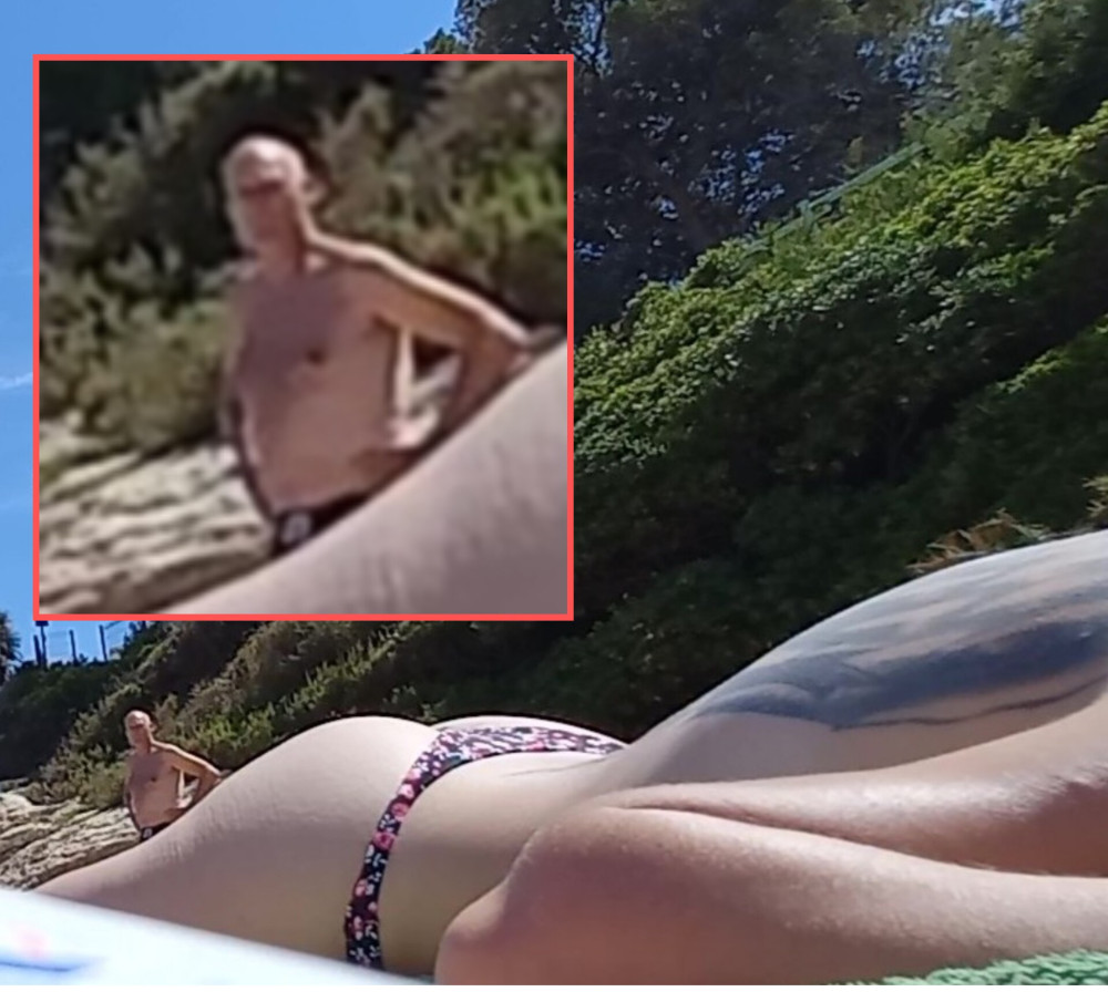 Pic #1Watched by guys topless beach