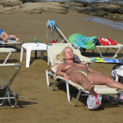 Pic #1Mature Blonde Lady with Big Tits Topless at the beach