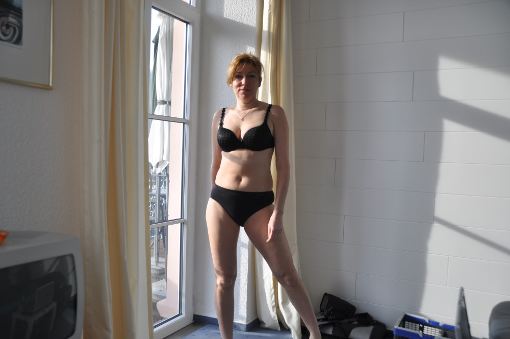 Pic #1Stripping in front of of window