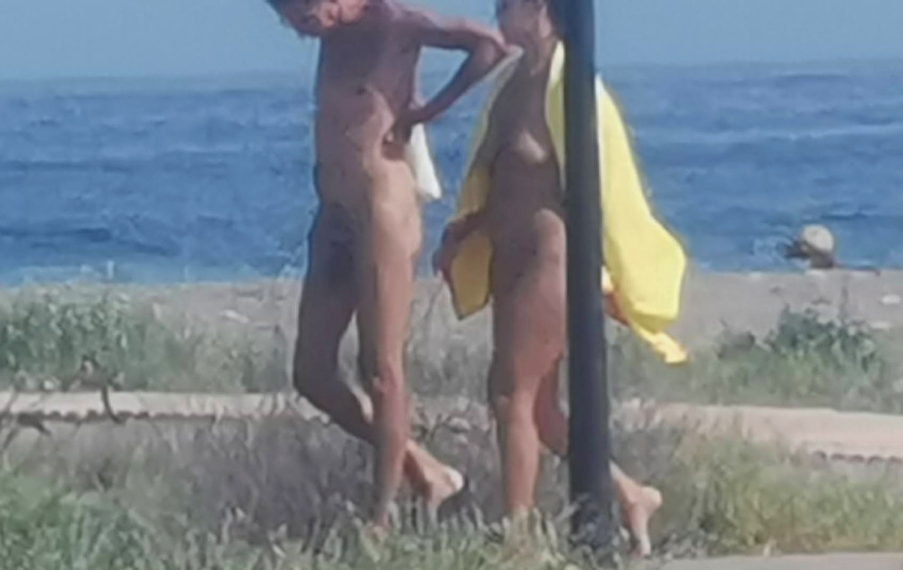Pic #1 A walk along the nude beach.
