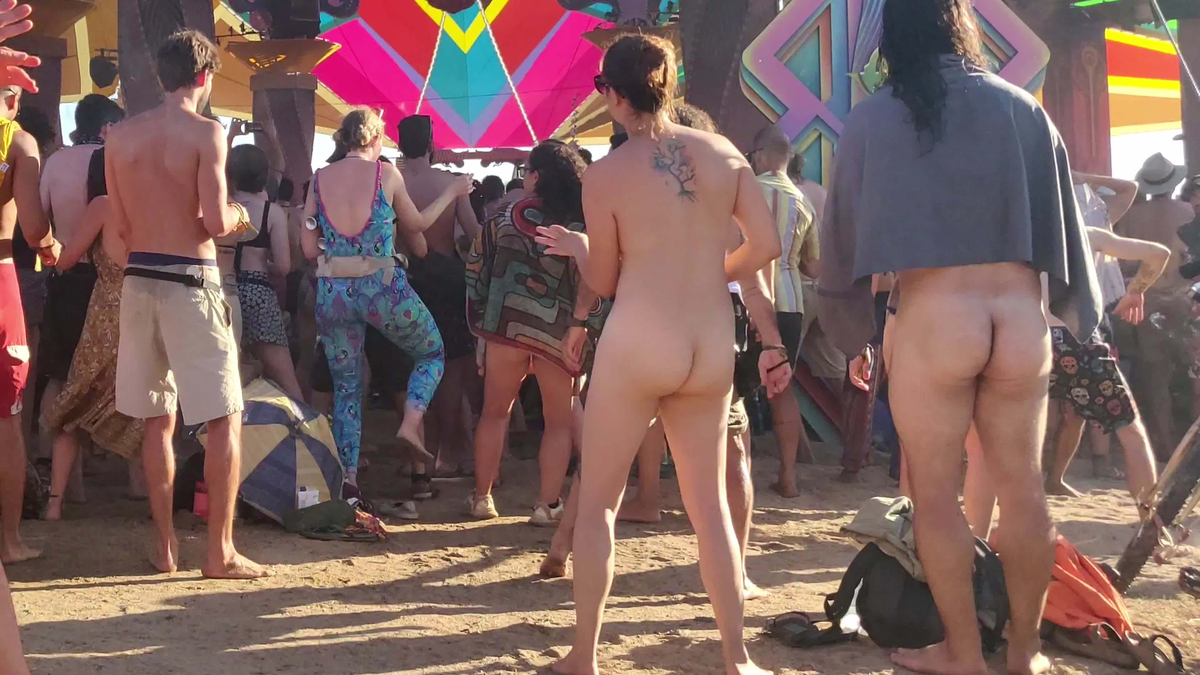 Pic #1Brunette dancing full naked at festival