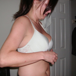 Jennifer getting undressed and showing her tits.