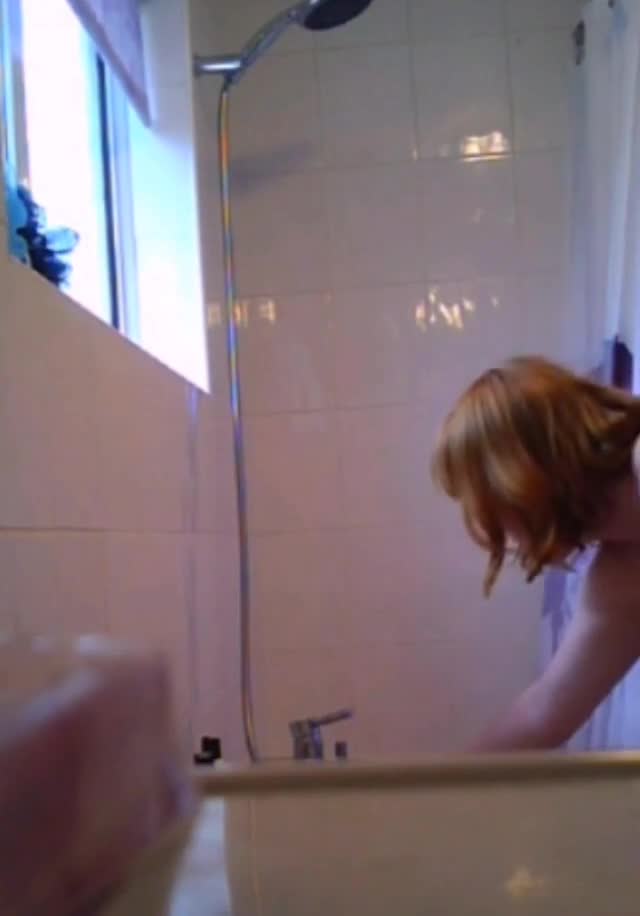 Pic #1Redhead Showering on Camera