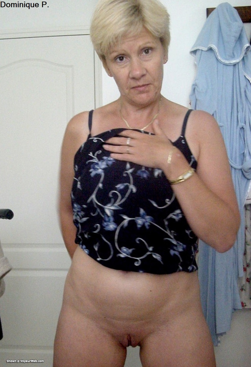 Pic #1Dominique P. generously exposed naked with smoothy twat
