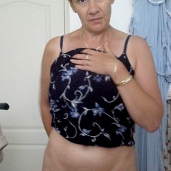 Dominique P. generously exposed naked with smoothy twat