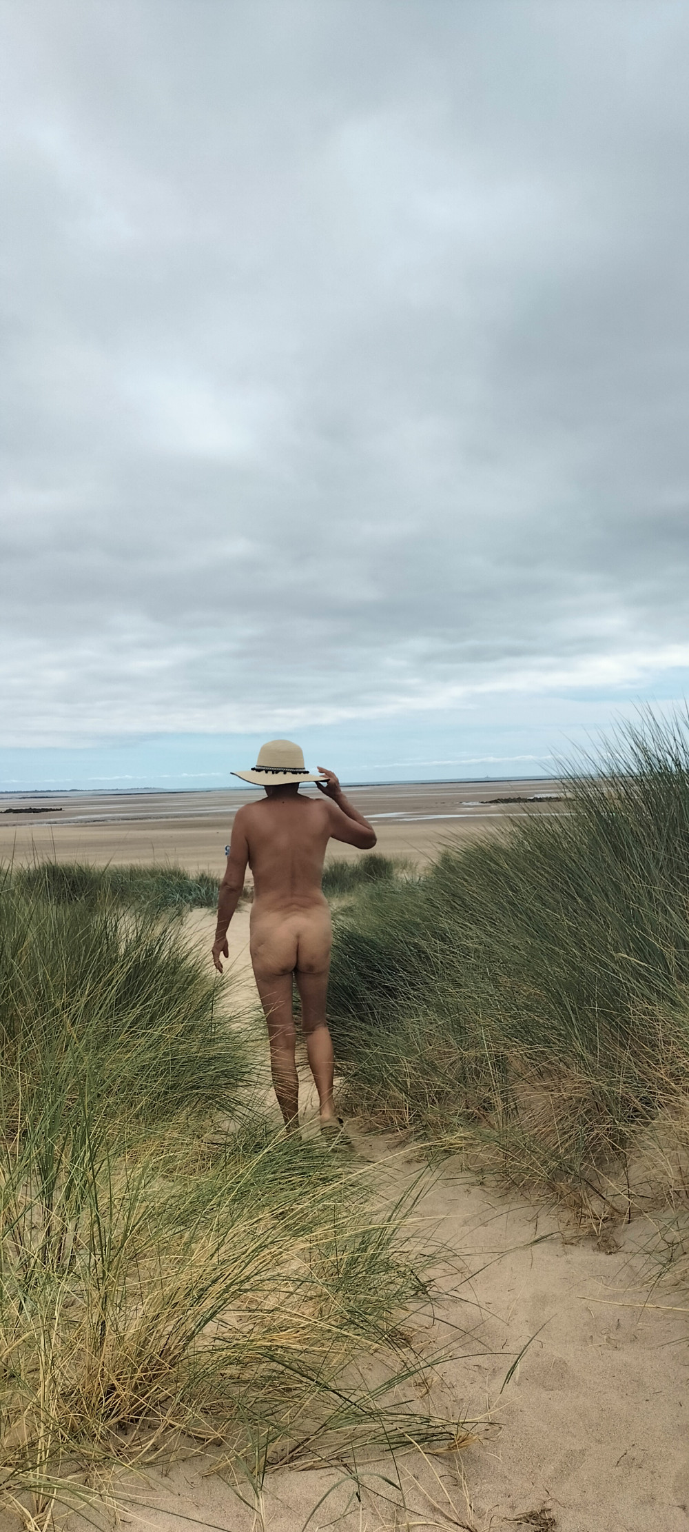 Pic #1Walking nude by the beach