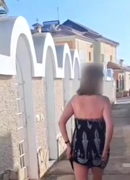Pic #1She wants you to see what's under her dress today.