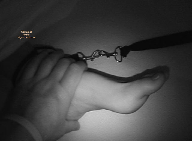 All Tied Up , My Husband Is A Workaholic Always Traveling And Leaving Me Home Alone, Bored.  I Finally Got Fed Up And Went Out With Some Single Friends To A Local Bar And Found Someone To Pay Attention To My Needs.  He Took Me To His Place, Tied Me Up, Teased Me Gently Until My Pussy Ached, And Then Fucked Me Hard For Two Days Straight.  I Get So Hot Thinking About It.  I Just Wonder What You Would Do With Me If You Have Me All Tied Up In Your Bed.  I Would Love To Hear.  Men With Imagination And Creativity Are A Huge Turn On.  Pictures Are From My Little Exursion. It Was So Spur Of The Moment And Not Planned Out, So The Pictures Aren't Great (I Think From Night Vision Camera), But Next Time.....