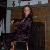 Pajama Party - Black Hair, Long Hair, Red Hair , Striped Satin Pj's, Long Curly Auburn Hair, Black And Red Silk Pajamas, Nipple Peeking Pajamas, Boob Slip, Sitting On Chair, Long Sleeved Pyjamas, Purple Striped Satin Pajamas, Men's Silk Pj's, Exposing One Breast, Side Blouse