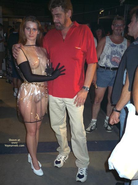 Nude In Public - Gloves, Nude In Public , Nude In Public, Shoulder Length Brunette, See Through Clothing, Plastic Dress, Black Gloves, Posing In A Group