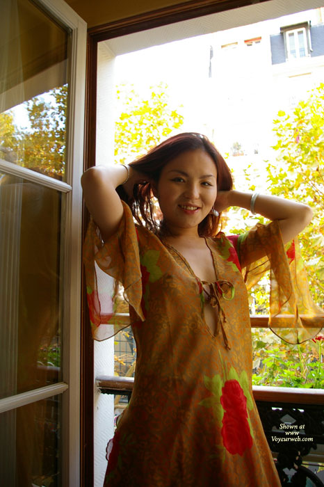 Chinese Ash , Cute 25 Years Old Adventurous Chinese Girl Who Came A Long Way To Europe To Have Her Picture Taken.