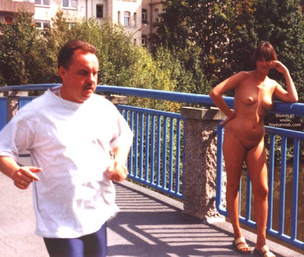 A Running Guy Ignoring Her , A Running Guy Ignoring Her, Full Nude On Bridge, Nude In Public